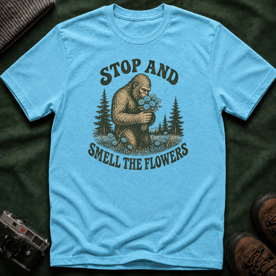 Bigfoot Stop and Smell the Flowers T-Shirt — Sasquatch Holding Daisies Retro Nature Tee