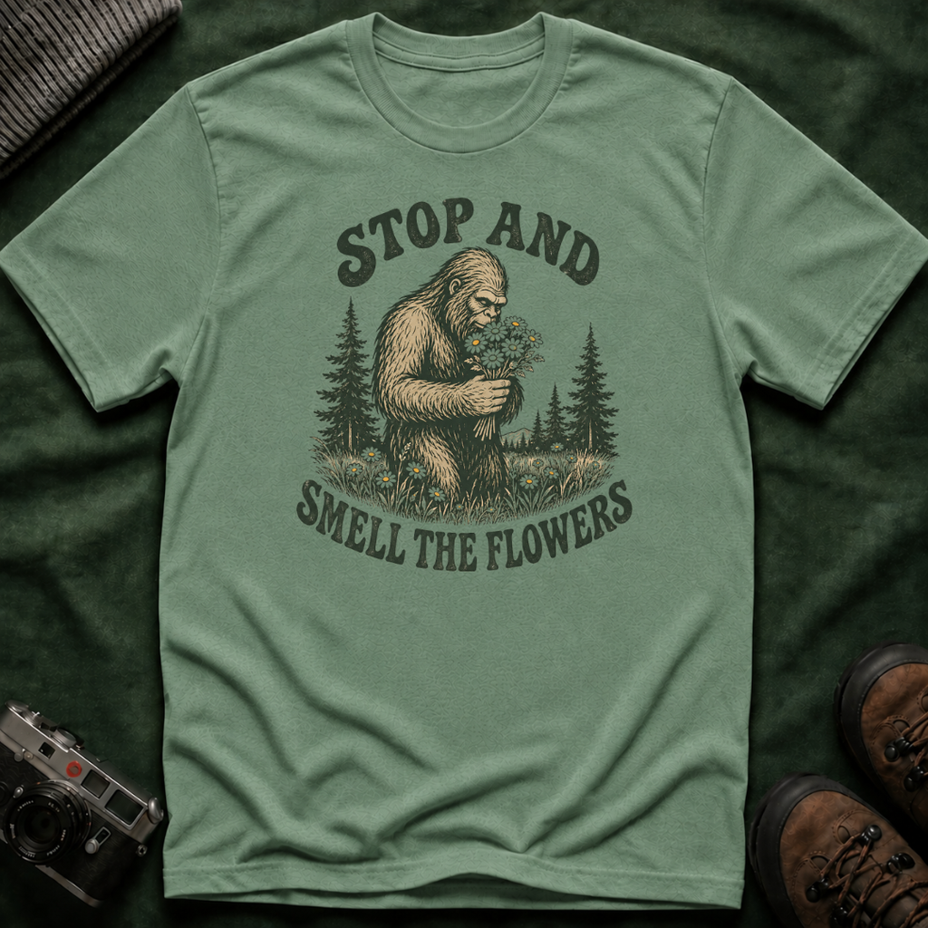 Bigfoot Stop and Smell the Flowers T-Shirt — Sasquatch Holding Daisies Retro Nature Tee