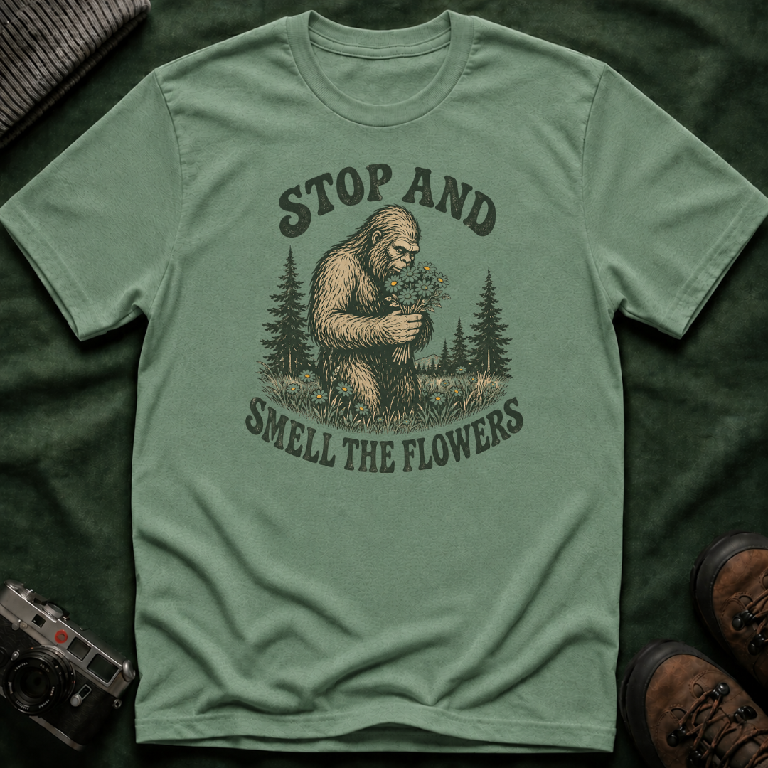 Bigfoot Stop and Smell the Flowers T-Shirt — Sasquatch Holding Daisies Retro Nature Tee