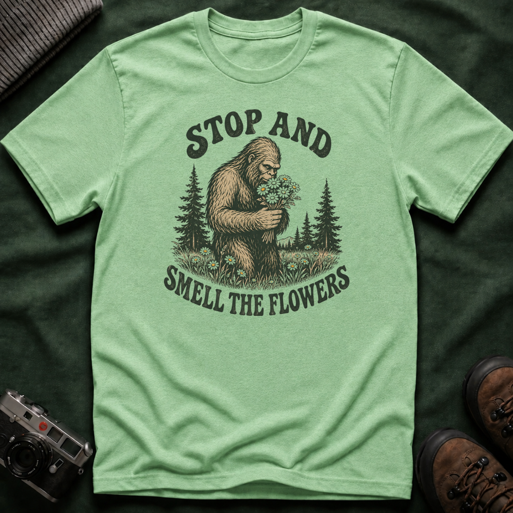Bigfoot Stop and Smell the Flowers T-Shirt — Sasquatch Holding Daisies Retro Nature Tee