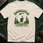 Sasquatch Country Club Golf T-Shirt — Retro 70s Woodland Golfer Tee
